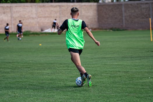 youth soccer players dribbling