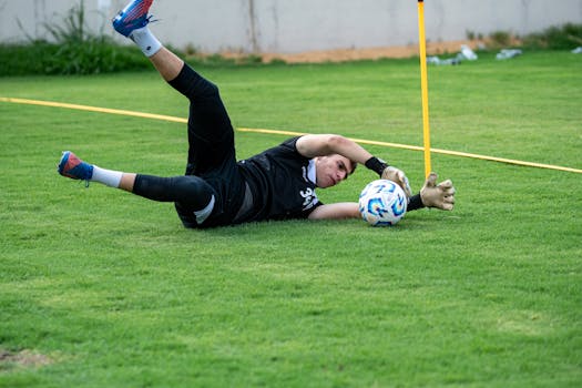 goalkeeper diving to save