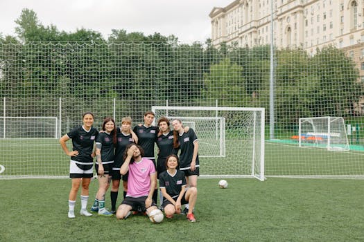 young soccer players practicing shooting