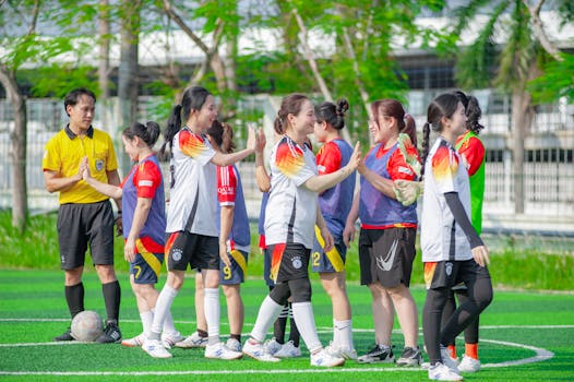 youth soccer game with referee