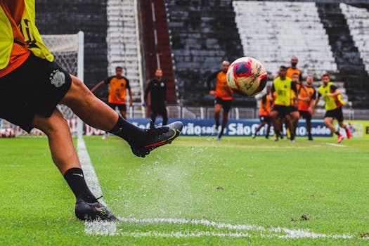 soccer players practicing shooting
